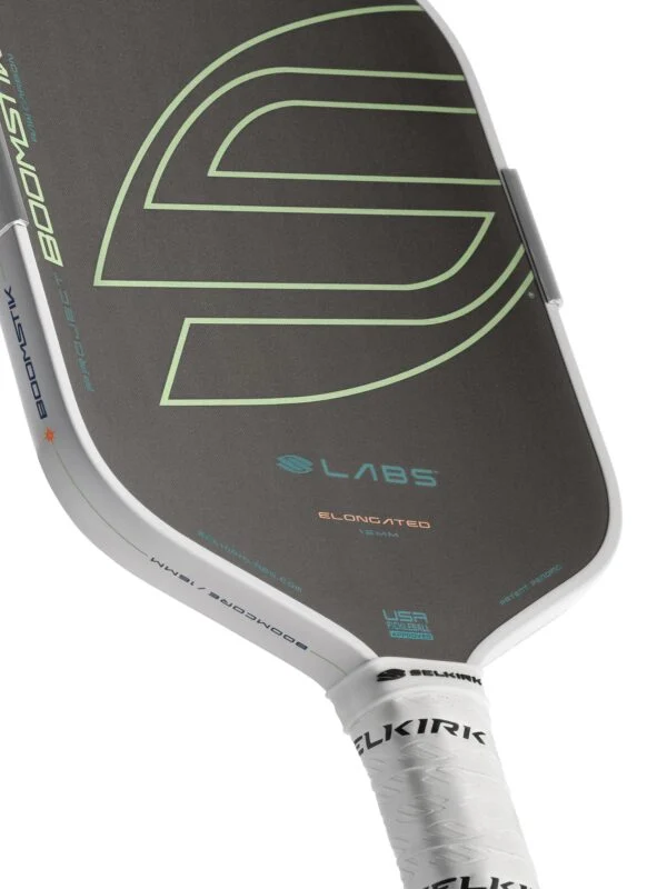Selkirk Boomstik Raw Carbon Asia Everglade Elongated — lower face and elongated 16mm marking Selkirk LABS Boomstik Raw Carbon Asia Elongated in Everglade, lower face and elongated 16mm marking