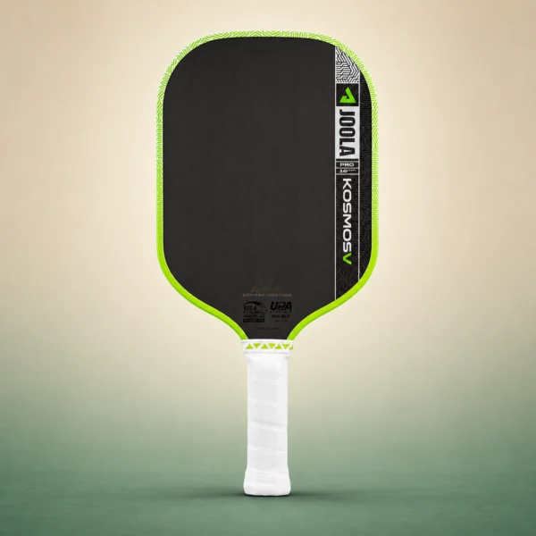 JOOLA Kosmos Pro V 16mm Pickleball Paddle - Surge Green (Federico Staksrud), front view on a sand and green studio background JOOLA Kosmos Pro V 16mm Pickleball Paddle - Surge Green (Federico Staksrud), front view