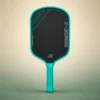 11SIX24 Hurache-X Power 2 Teal — front on sand and green studio background 11SIX24 Hurache-X Power 2 Teal — front on sand and green studio background